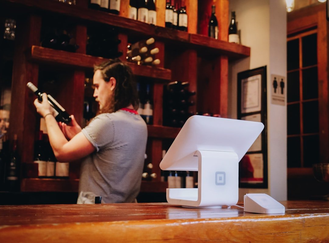 woman-standing-and-looking-on-bottle-s-1ip-eo-cg